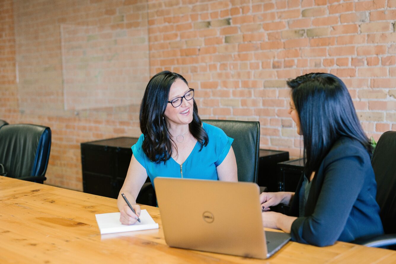 women getting financial advice from a female financial advisor on how to retire